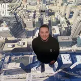 Marc on The Ledge at the top of the Willis (Sears) Tower.